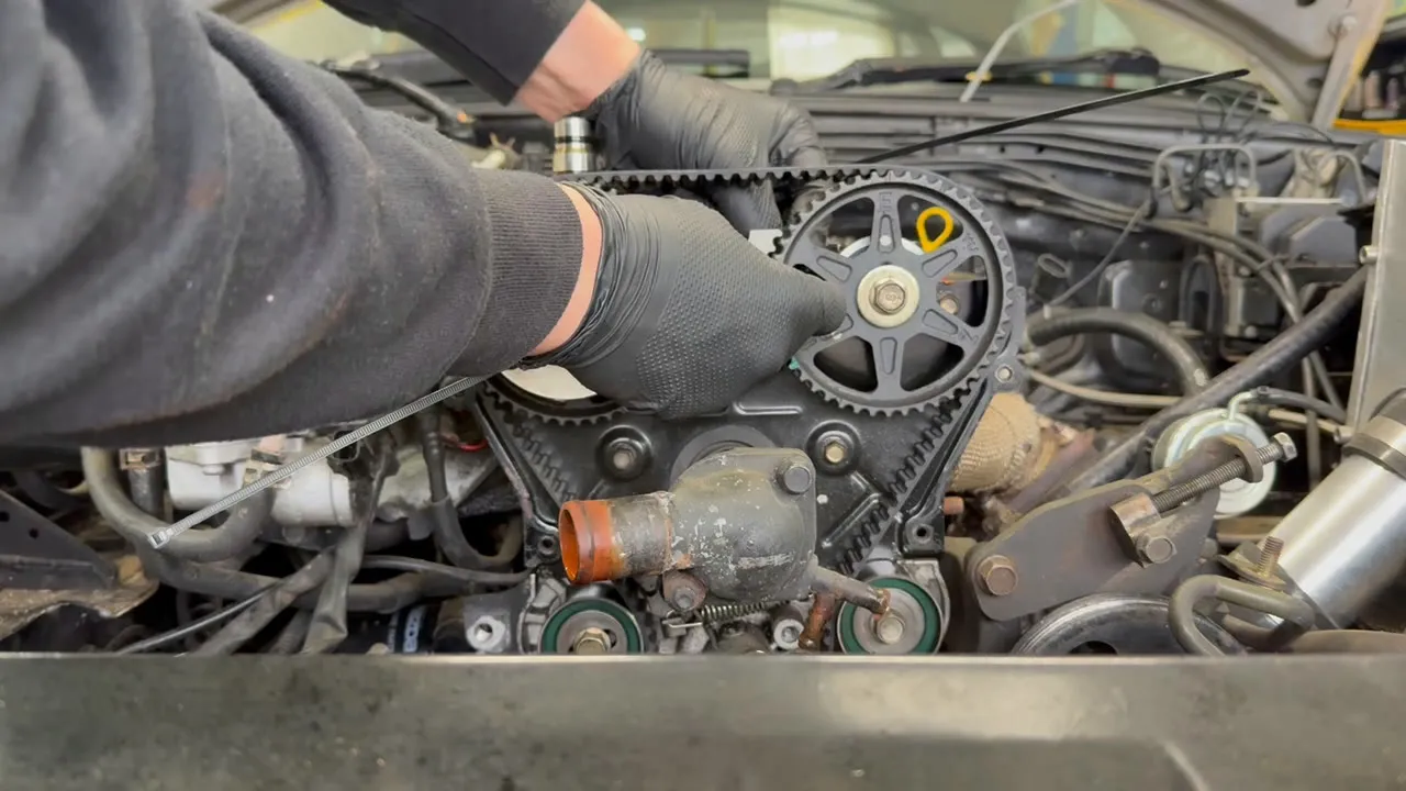 Setting the engine to its timing position and checking the marks
