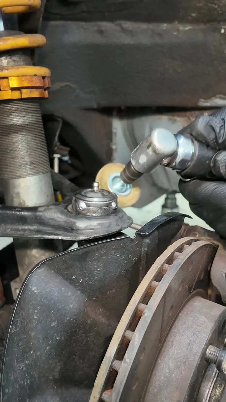 An airline blowing on the ball joint to draw heat away while it is tacked