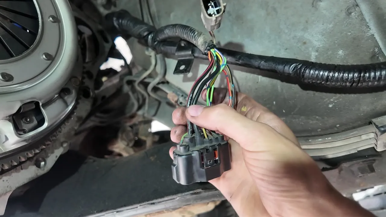 The automatic transmission loom plug with its wires fanned out for identification