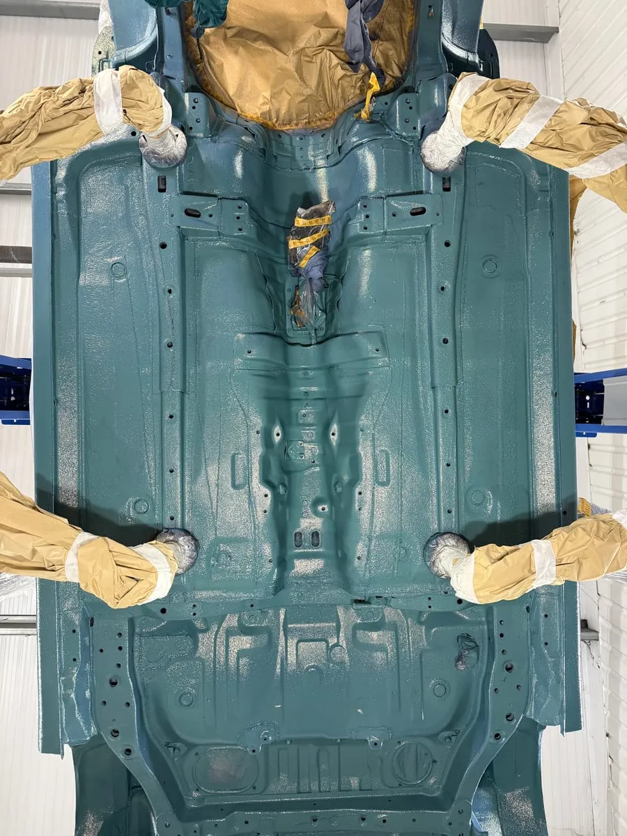Underbody in rust encapsulating primer