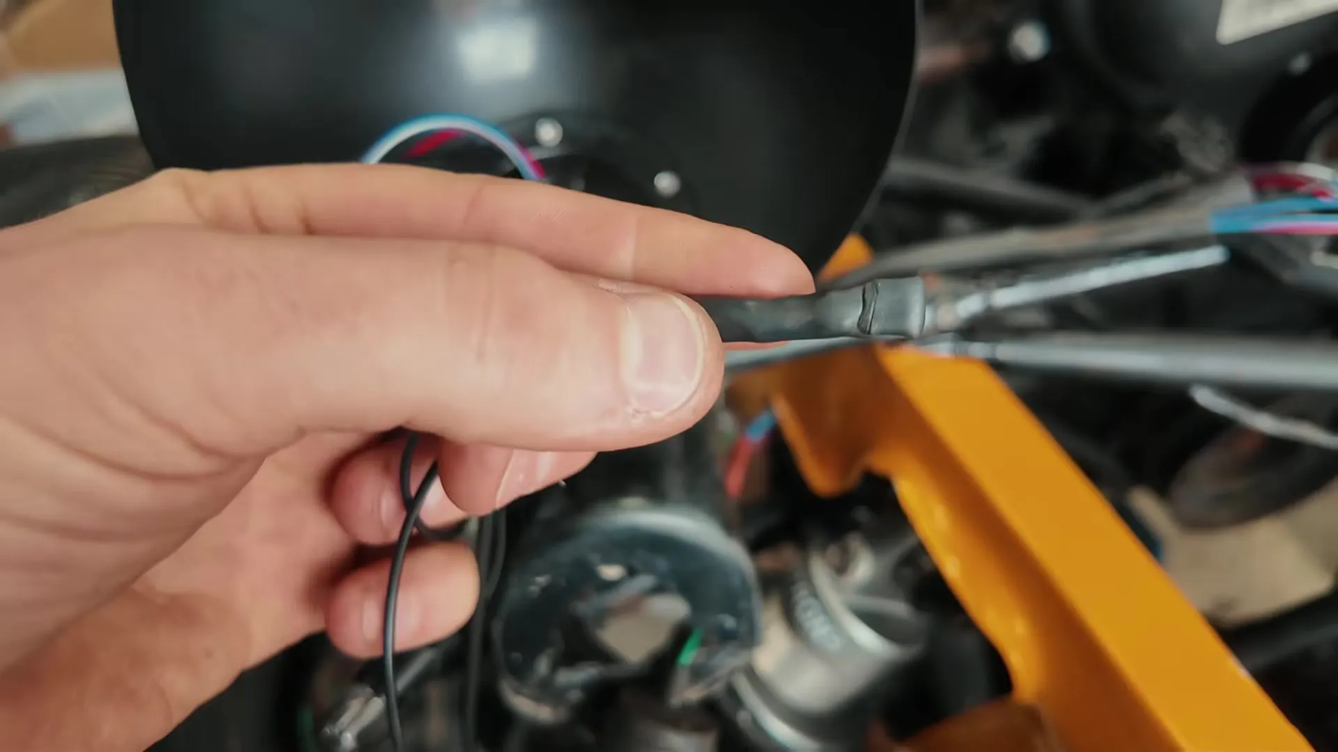 The new spliced and heat shrunk chassis ground
