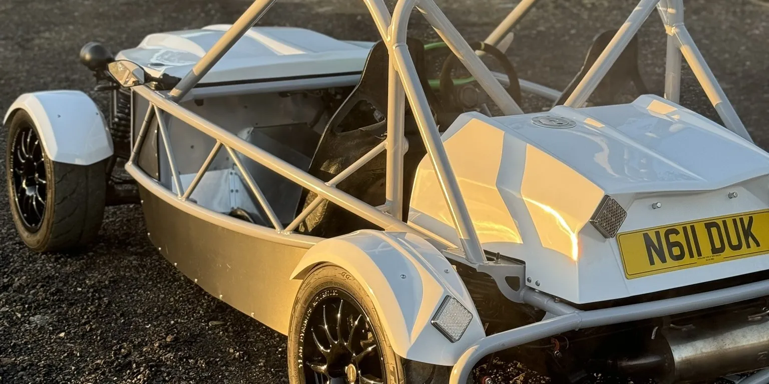The finished Exocet from behind on the gravel in low morning sun