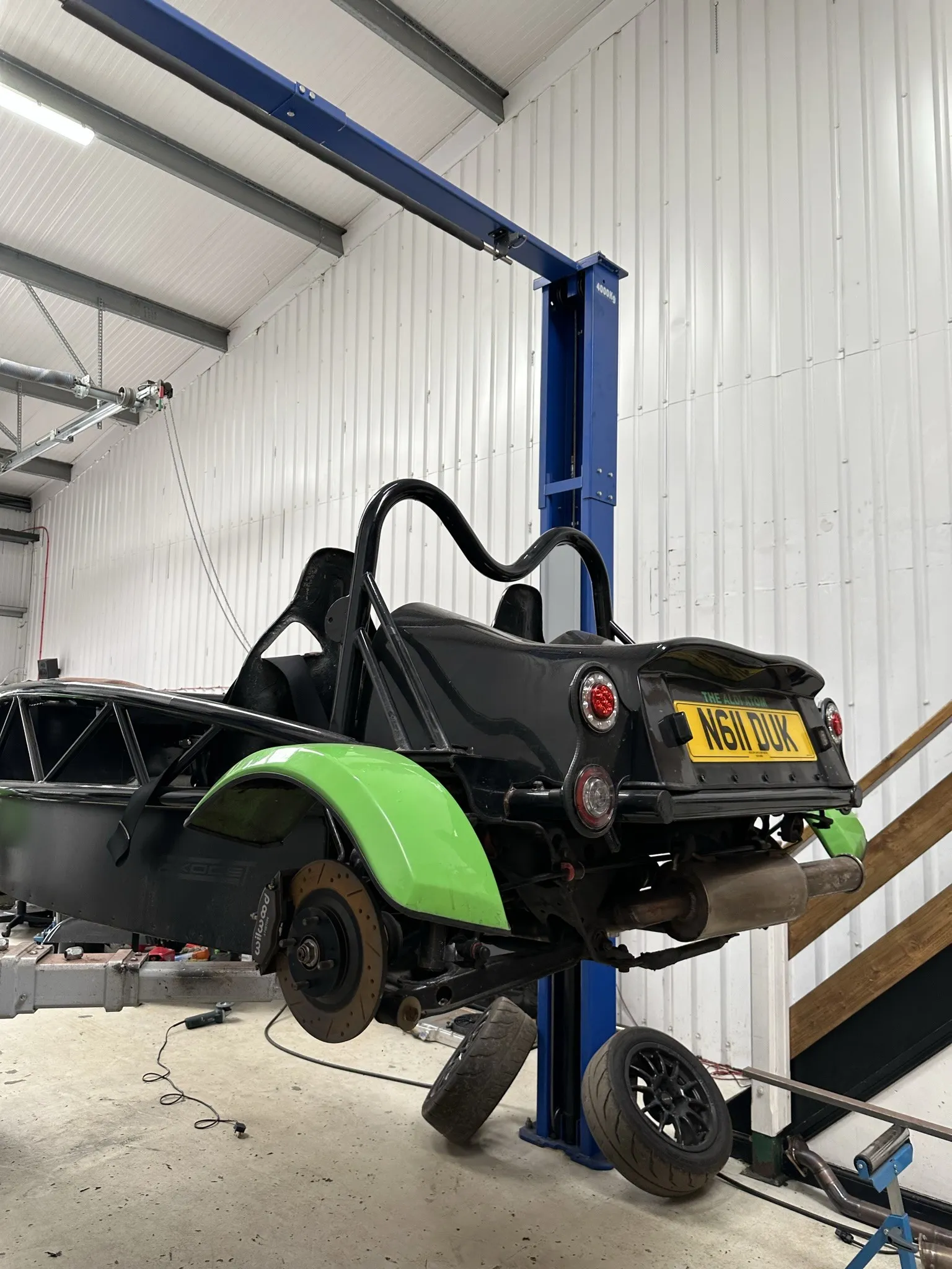 The old Exocet on the ramp in August 2023, black chassis and green arches