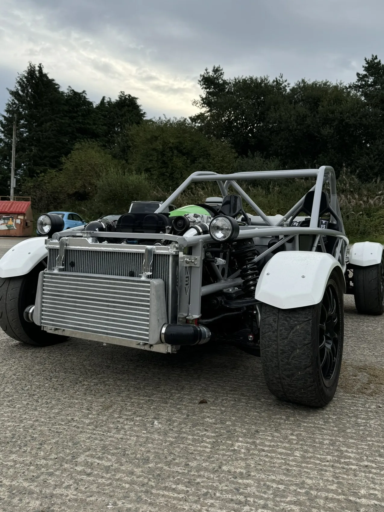 The front of the car outside the unit with the radiator and intercooler mounted and the bonnet off