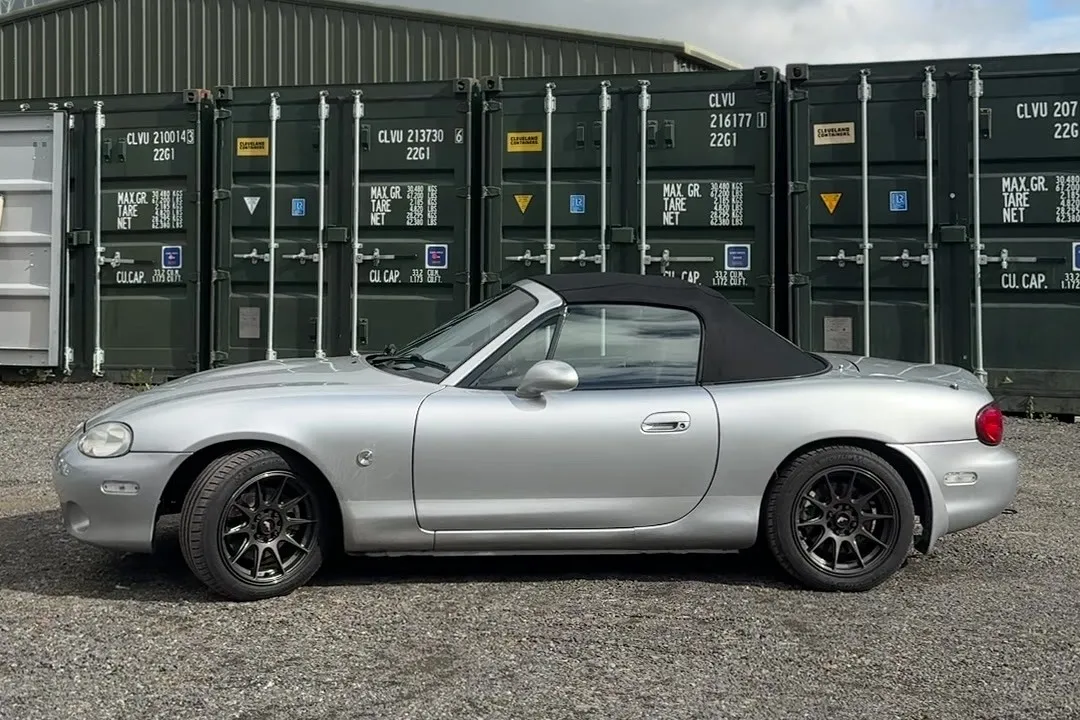 The finished silver Mk2.5 in side profile, roof up, on black wheels