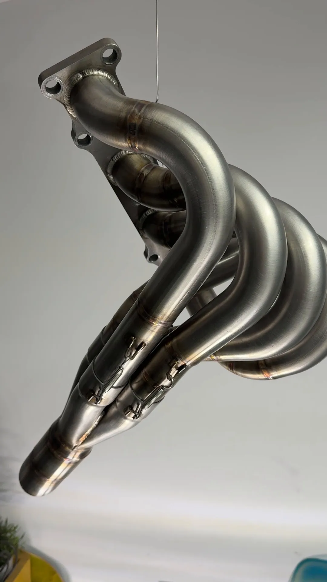 The other side of the finished manifold, showing the runner routing into the collector