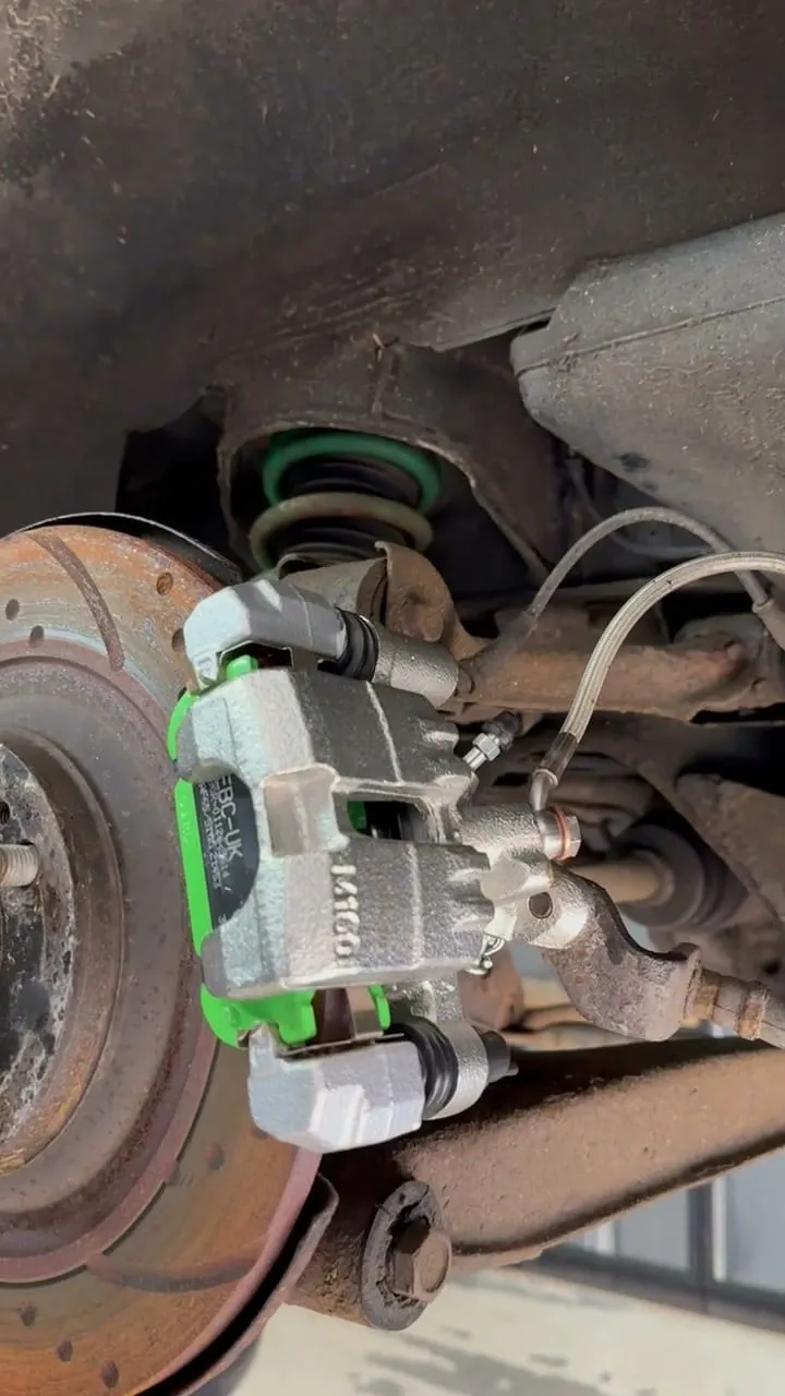 New rear caliper, Greenstuff pads and a braided line on the grooved disc
