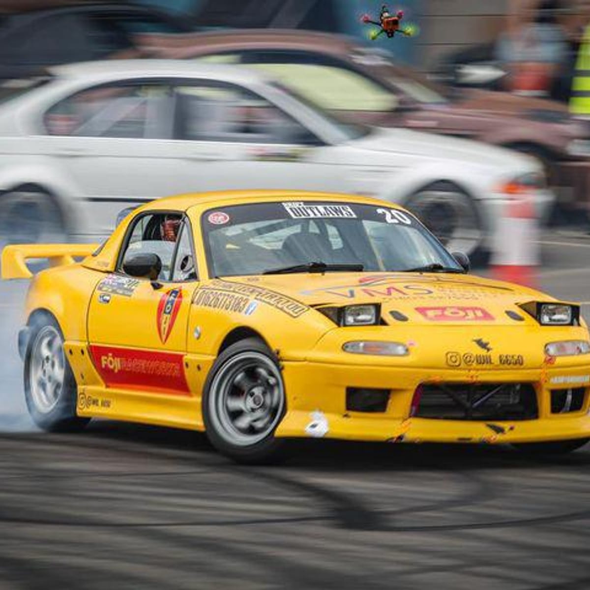 FOJI-liveried MX-5 mid-drift at a track day