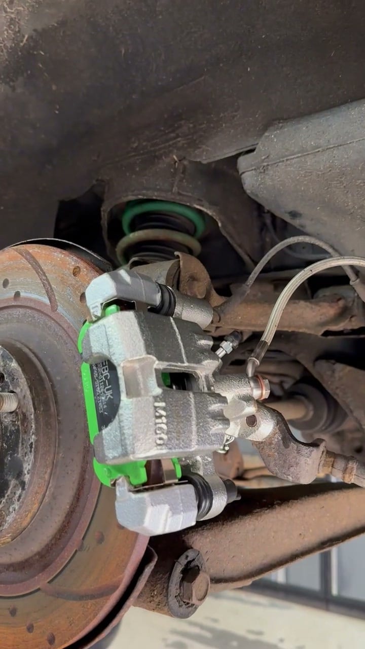 New rear caliper, Greenstuff pads and a braided line on the grooved disc